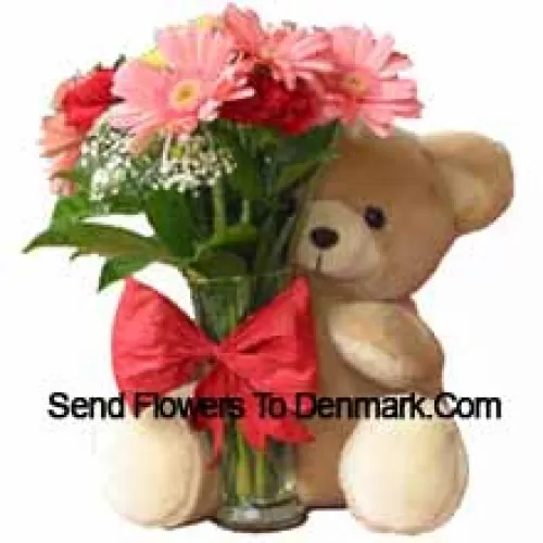 11 Red Carnations And Pink Gerberas In A Glass Vase Decorated With A Bow And Accompanied With A Cuddly Teddy Bear