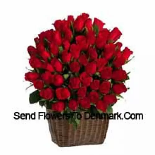 A Tall Basket Of 75 Red Roses With Seasonal Fillers