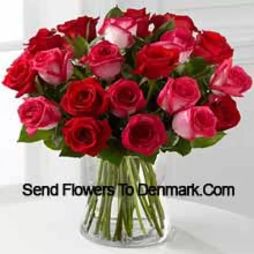 23 Roses ( 11 Red And 12 Dual Toned Pink ) With Seasonal Fillers In A Glass Vase